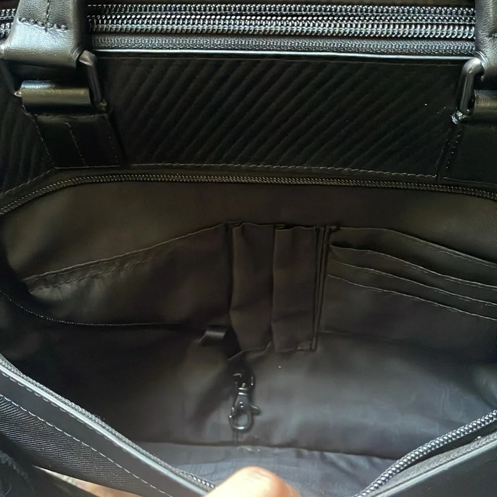 Tumi Canvas Black Laptop Bag with Carbon Fiber Accents